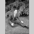 Man sitting on  lawn (ddr-densho-426-2178)