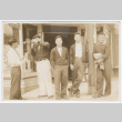 Five men standing outside drugstore (ddr-densho-383-392)