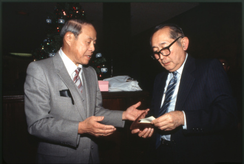 Two men talking (ddr-densho-1007-749)