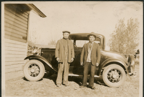 Two men by car (ddr-densho-293-204)