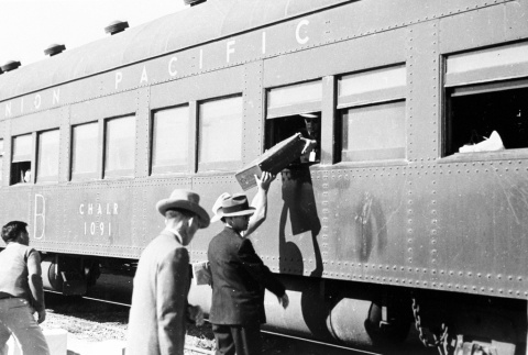 Japanese Americans relocating to a different camp (ddr-densho-37-289)