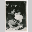 Older woman with infant (ddr-densho-501-22)