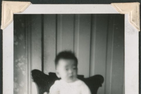 Baby standing on a chair (ddr-densho-321-105)