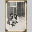 The Kikawas pose with a teddy bear (ddr-densho-542-462)