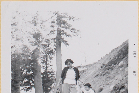 Yoshiko and Leslie Shiomi walking on a trail (ddr-densho-522-559)