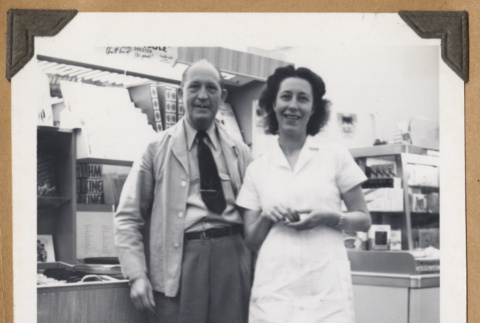 Man and woman at The Owl Drug Co. (ddr-densho-542-99)