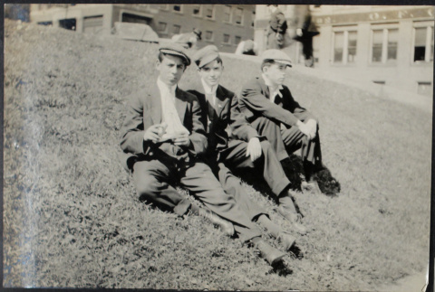 Three men sitting on hill (ddr-densho-355-616)