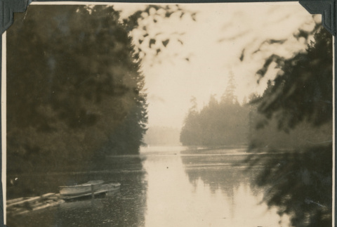 Boat and dock on river (ddr-densho-483-523)