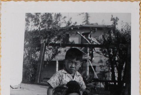 William Shiomi with puppy (ddr-densho-522-220)