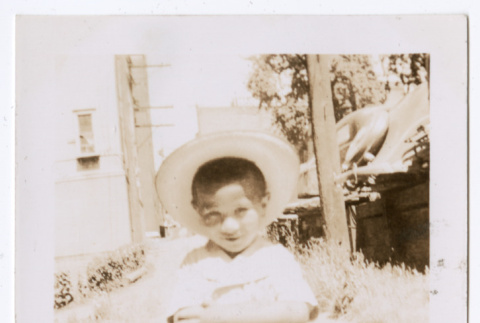 Photo of child in a sunhat (ddr-densho-483-737)