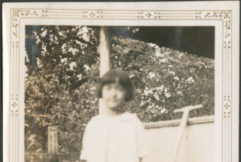 Girl by porch (ddr-densho-316-272)