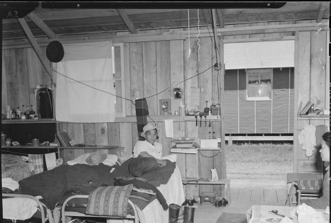 Japanese American inside barracks (ddr-densho-37-485)