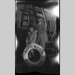 Man and girl posing with life ring of Ryoyo Maru, Yokahama (ddr-densho-426-2001)