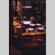 Display of enamelware bowls and coffee pots, lacquerware ashtrays (ddr-densho-426-334)