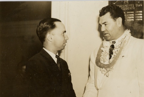 Jack Dempsey shaking hands with a man (ddr-njpa-1-163)