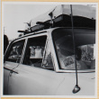 Group sitting in car (ddr-densho-522-101)