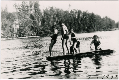 Group of children on a log (ddr-densho-353-240)