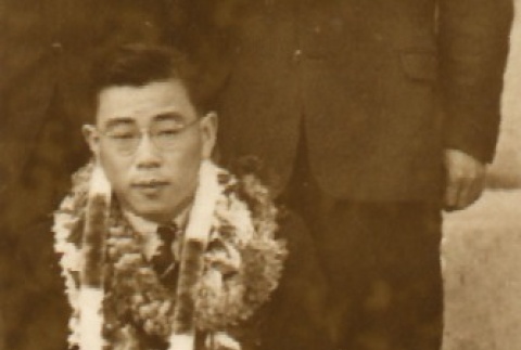 Man wearing leis (ddr-njpa-4-2033)