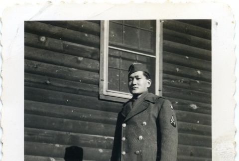 Soldier in front of a building (ddr-densho-22-165)