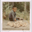 Mark Isoshima with mushrooms (ddr-densho-477-363)