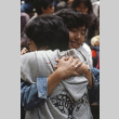 Mariko Yanagihara and Trace Tanimoto hugging on the last day of camp (ddr-densho-336-1617)
