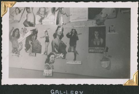 Wall with clippings of pinups from magazines (ddr-densho-434-347)