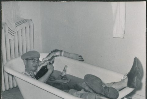 Man asleep in bathtub (ddr-densho-523-270)