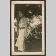 Woman standing under a tree (ddr-densho-433-819)