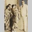 Lawrence M. Judd with young women in kimono (ddr-njpa-2-483)