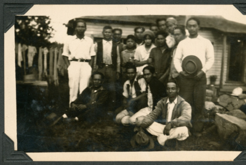 Group photo outside a house (ddr-densho-483-195)