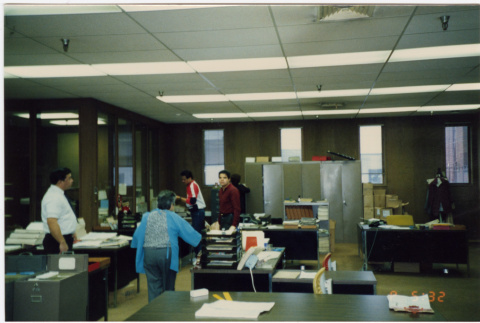 Group standing in office (ddr-densho-426-387)