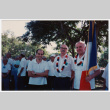 Men with flag in veterans parade (ddr-densho-368-409)