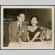 Couple sitting at a table (ddr-densho-379-487)