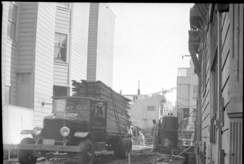 Truck delivering lumber to job site (ddr-densho-426-2165)