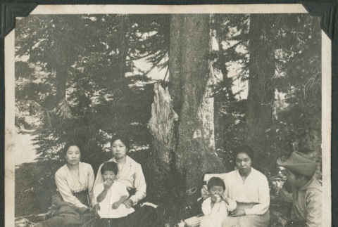 Family picnicing in the forest (ddr-densho-321-563)