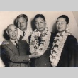 Hayato Ikeda posing with Chamber of Commerce president, Japanese dignitary, and his secretary (ddr-njpa-4-152)