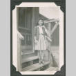 Woman standing on barrack steps (ddr-densho-463-14)