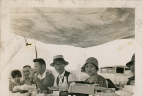 Men and women at picnic table (ddr-densho-348-53)