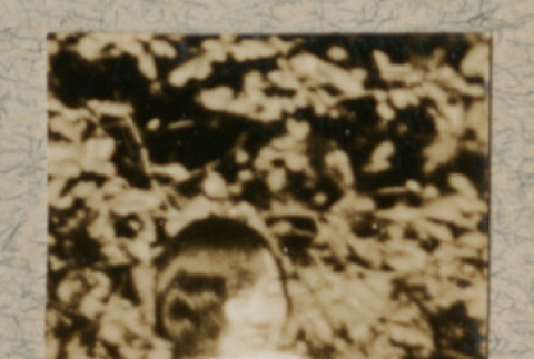 Toots Yamamoto looking over shoulder (ddr-densho-383-330)