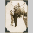 Man and woman walking away (ddr-densho-383-192)