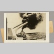 Photograph of German ship cannons firing (ddr-njpa-13-975)
