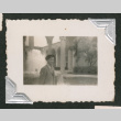 Young man in front of fountain (ddr-densho-550-226)