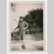 Soldier standing in front of statue (ddr-densho-368-182)