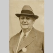 Man wearing a suit and hat (ddr-njpa-2-1086)