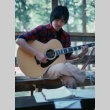 Brad Shirakawa playing guitar (ddr-densho-336-1487)