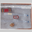 WWII Victory ribbon, Service pin and discharge pin (ddr-densho-539-129)