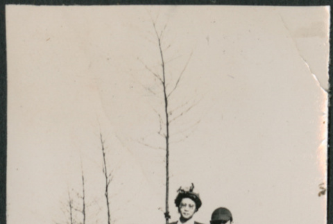 Woman with three boys (ddr-densho-523-190)