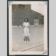 Wanda Brown in front of school (ddr-densho-550-129)