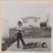 William Shiomi with boy pretending to be shot by an arrow (ddr-densho-522-285)