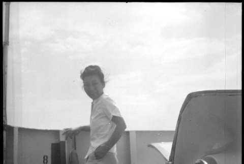 Woman standing on ferry deck (ddr-densho-329-699)